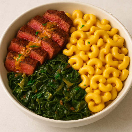 CAJUN BUTTER STEAK WITH BRAISED GREENS & VEGAN MAC